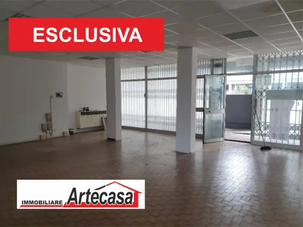 Negozio in Via Papa Giovanni XXIII 26, Reggio Emilia, {3} - Foto 1